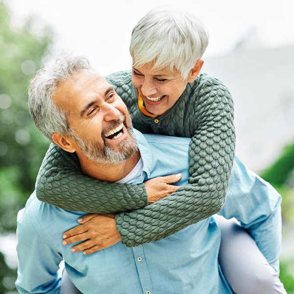 mature couple smiling together